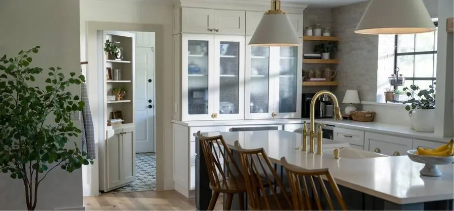 A Murphy Door® hidden door built into a bright kitchen entryway. Photo from murphydoor.com.