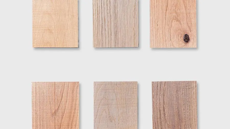 Six T3D texture-engineered hardwood swatches laid out on a neutral background, showing the range of species, grain, and cross-scored texture patterns. Photo from t-three-d.myshopify.com.