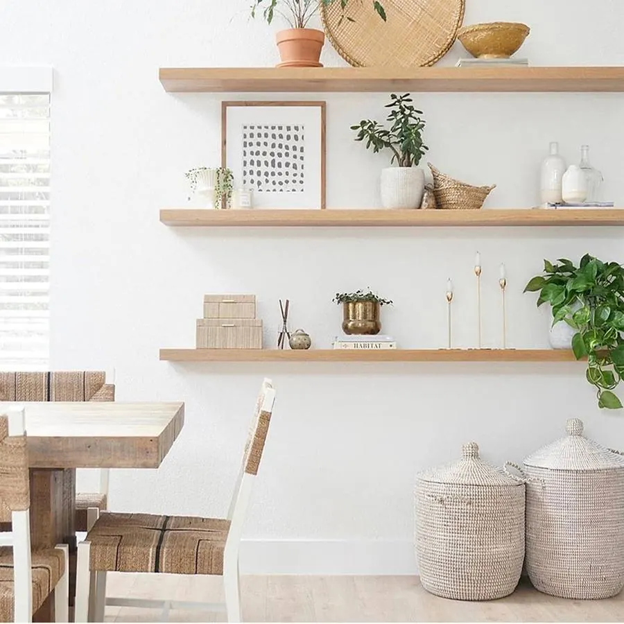 Studio product shot of a white oak floating shelf in a natural finish, showing the open grain. Photo from ultrashelf.com.